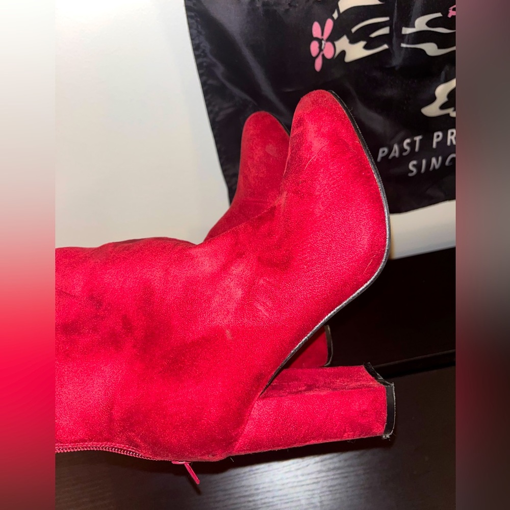 The perfect holiday bootie! Gently worn red suede booties by Krush